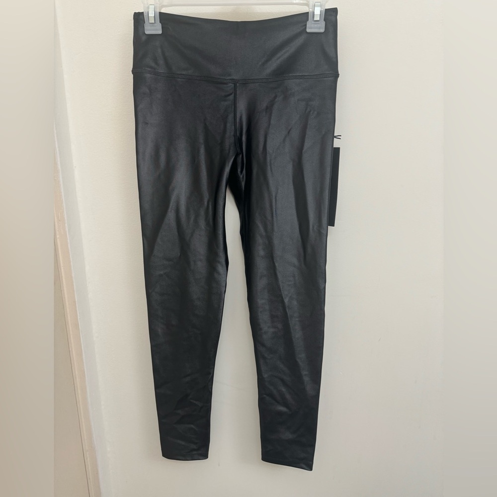 Noli black liquid leggings. Never worn. Still has tags. Color black.